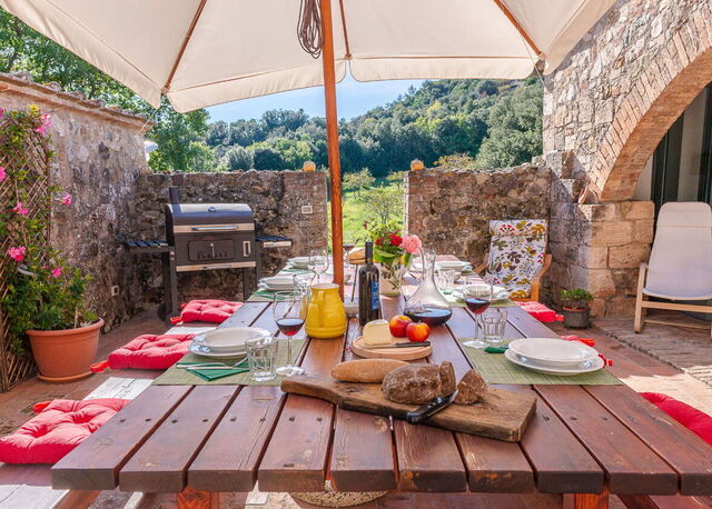 Podere Vignali, cena al aire libre