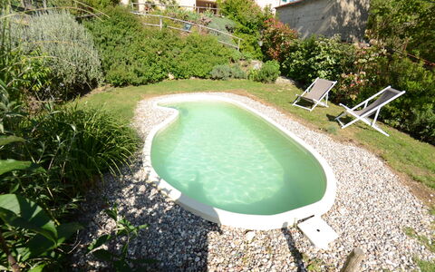 Al Colle Di Lari: Piscina, Propiedad, Paisaje Natural, Hierba, Agua, Casa, Bienes Raíces, Ocio, Inmuebles, Paisaje