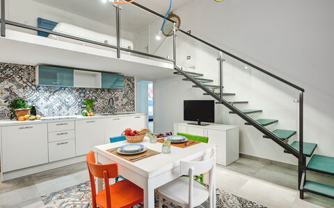 Loft In Sorrento: Mueble, Gabinetes, Propiedad, Mostrador, Mesa, Cocina, Naranja, Encendiendo, Diseño De Interiores, Silla