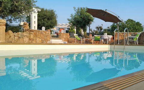 Villa Giunone: Piscina, Propiedad, Agua, Bienes Raíces, Paraguas, Azur, Agua, Reflexión, Recurso, Sombra