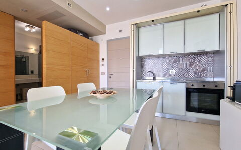 Suite Le Vele: Mueble, Diseño De Interiores, Piso, Suelo, Madera, Cocina, Mostrador, Aparato De Cocina, Techo, Electrodoméstico