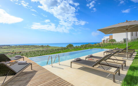 Villa Topazio - Sea View | By Rocco Forte Villas: Nube, Cielo, Agua, Edificio, Balneario, Azur, Planta, Mueble Para Exteriores, Sombra, Condominio