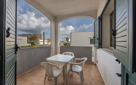 Andromeda Apartment In Gallipoli: Cielo, Propiedad, Mueble, Mesa, Nube, Silla, Edificio, Madera, Ventana, Diseño De Interiores