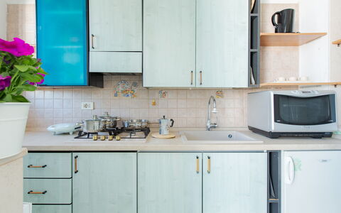 Casa Laura: Azul, Cocina, Aparato De Cocina, Mostrador, Electrodoméstico, Madera, Gabinetes, Piso, Fregadero, Diseño De Interiores