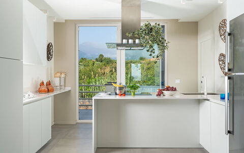 Villa del Faro: Cocina, Mostrador, Mueble, Aparato De Cocina, Diseño De Interiores, Gabinetes, Piso, Electrodoméstico, Madera, Suelo