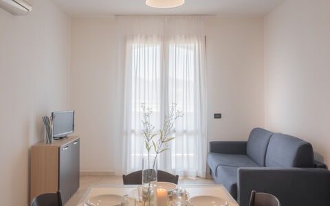 Le Fontane Apartments In Villasimius: Diseño De Interiores, Mueble, Piso, Suelo, Madera, Habitación, Techo, Encendiendo, Departamento, Sala