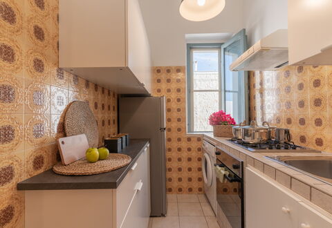 Casa Olimpo: Cocina, Diseño De Interiores, Aparato De Cocina, Mostrador, Electrodoméstico, Piso, Suelo, Techo, Arreglo De Tubería, Estufa De Cocina