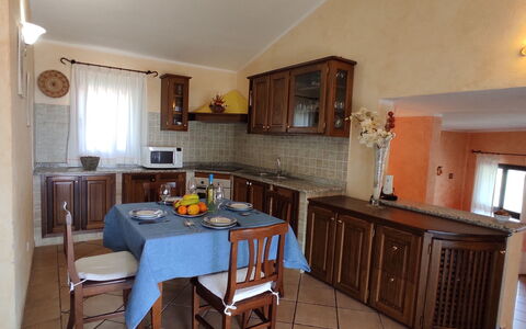 Belvedere Apartment Ac, Budoni: Mueble, Diseño De Interiores, Piso, Madera, Mostrador, Cocina, Silla, Mesa, Gabinetes, Suelo