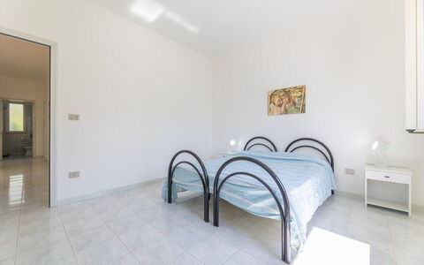 Villetta Bluette, Marina di Mancaversa: Piso, Suelo, Diseño De Interiores, Techo, Habitación, Cama, Habitación, Departamento, Lecho, Sábana