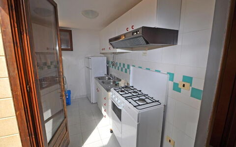Appartamento Calanca, Marina di Mancaversa: Cocina, Electrodoméstico, Aparato De Cocina, Estufa De Cocina, Piso, Mostrador, Madera, Suelo, Estufa De Gas, Diseño De Interiores