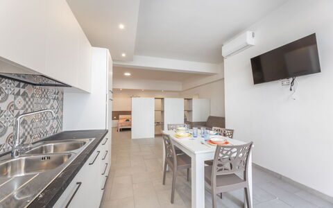 Appartamento Monomare, Gallipoli: Piso, Suelo, Diseño De Interiores, Techo, Mostrador, Cocina, Habitación, Departamento, Electrodoméstico, Suelos De Madera