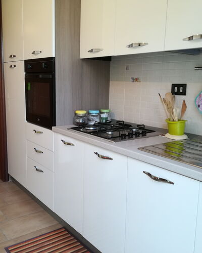 Villa Maddalena: Cocina, Electrodoméstico, Aparato De Cocina, Mostrador, Estufa, Estufa De Cocina, Piso, Gabinetes, Electrodoméstico, Estufa De Gas
