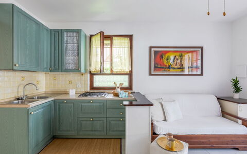 Veranda sul Conero: Mueble, Diseño De Interiores, Gabinetes, Piso, Madera, Cocina, Mostrador, Suelo, Aparato De Cocina, Habitación