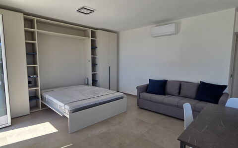 Villa Pineta della Rovere: Mueble, Piso, Suelo, Diseño De Interiores, Madera, Habitación, Departamento, Encendiendo, Habitación, Cama