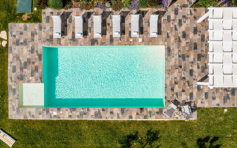Dama dei Venti 6+2: Piscina, Recurso, Mueble Para Exteriores, Piso, Material Compuesto, Ocio, Eco Hotel, Thermae, Fuente De Agua, Silla